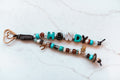 Howdy Turquoise 2-strand loop with turquoise and brown HOWDY letters, turquoise and agate beads, cactus and horseshoe charms and a rose gold heart clasp