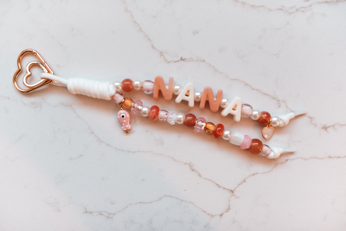 Nana Blush 2-strand loop in blush, terracotta and cream with NANA letter beads, a pink fish charm, a pearl heart and a rose gold heart clasp