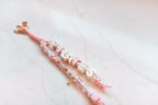 Pilates Princess loop at an angle on white marble